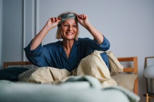 Portrait of a Happy Older Woman Waking up in the Morning at Home