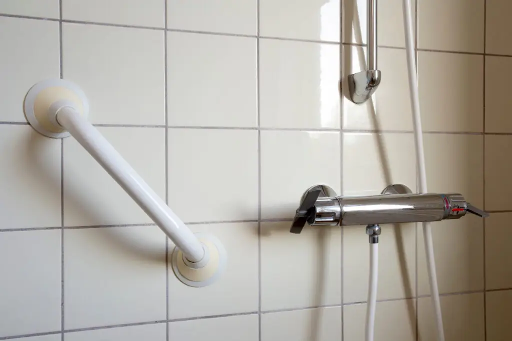 Bathroom grab bar installed near shower.